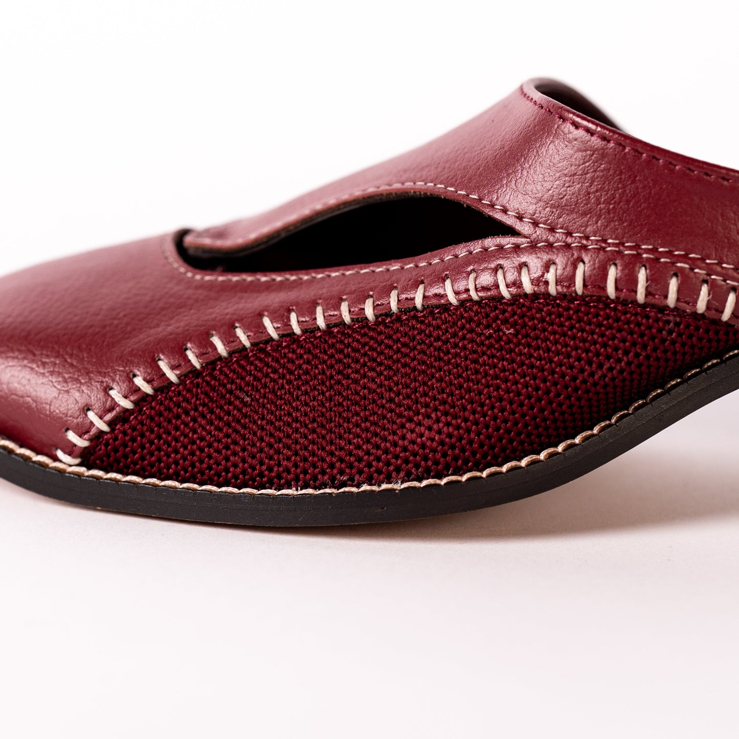 Burgundy shoe on a white background