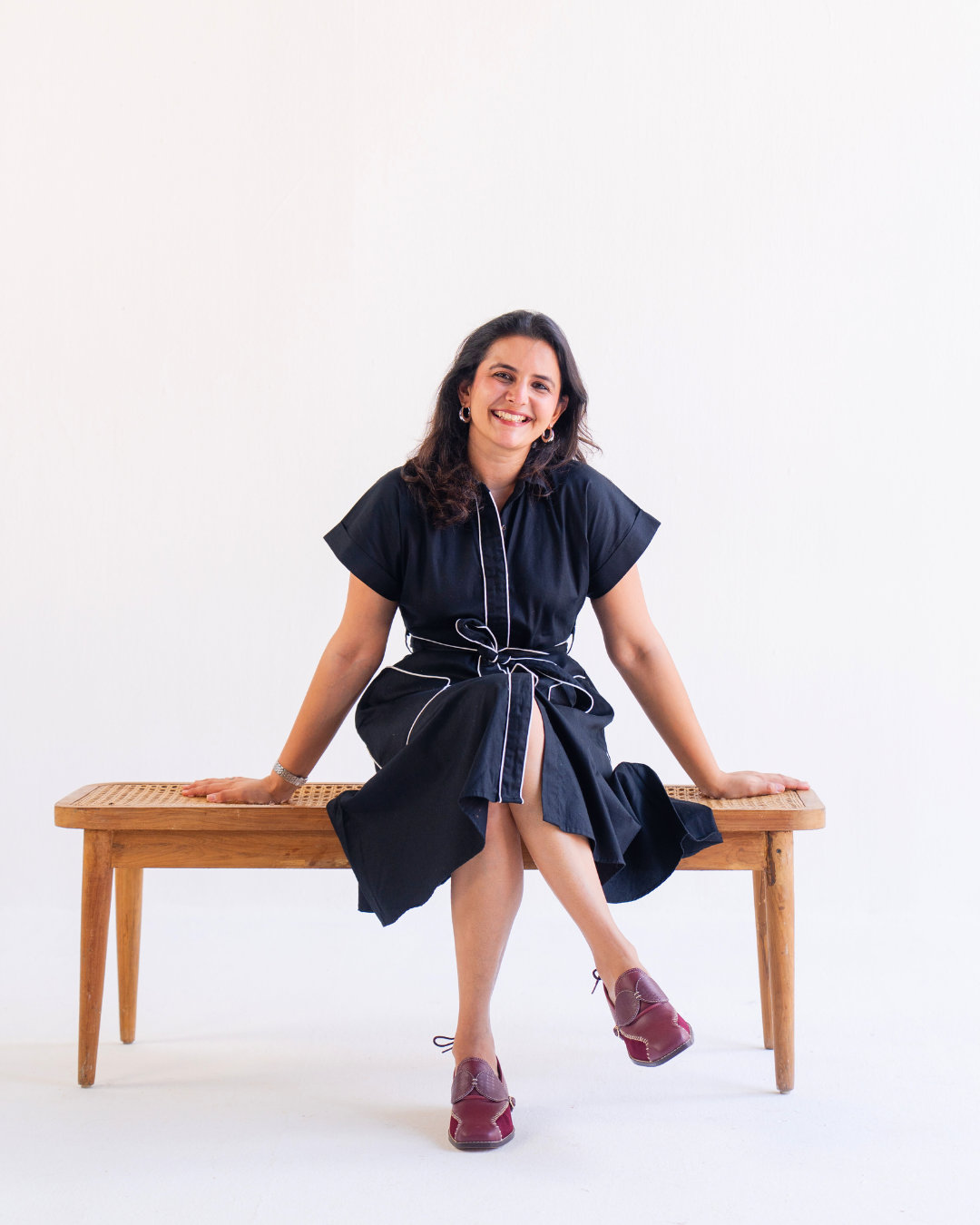 Founder of Suvaa wearing handcrafted footwear